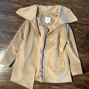 Tan overcoat with fuzzy exterior and polyester interior